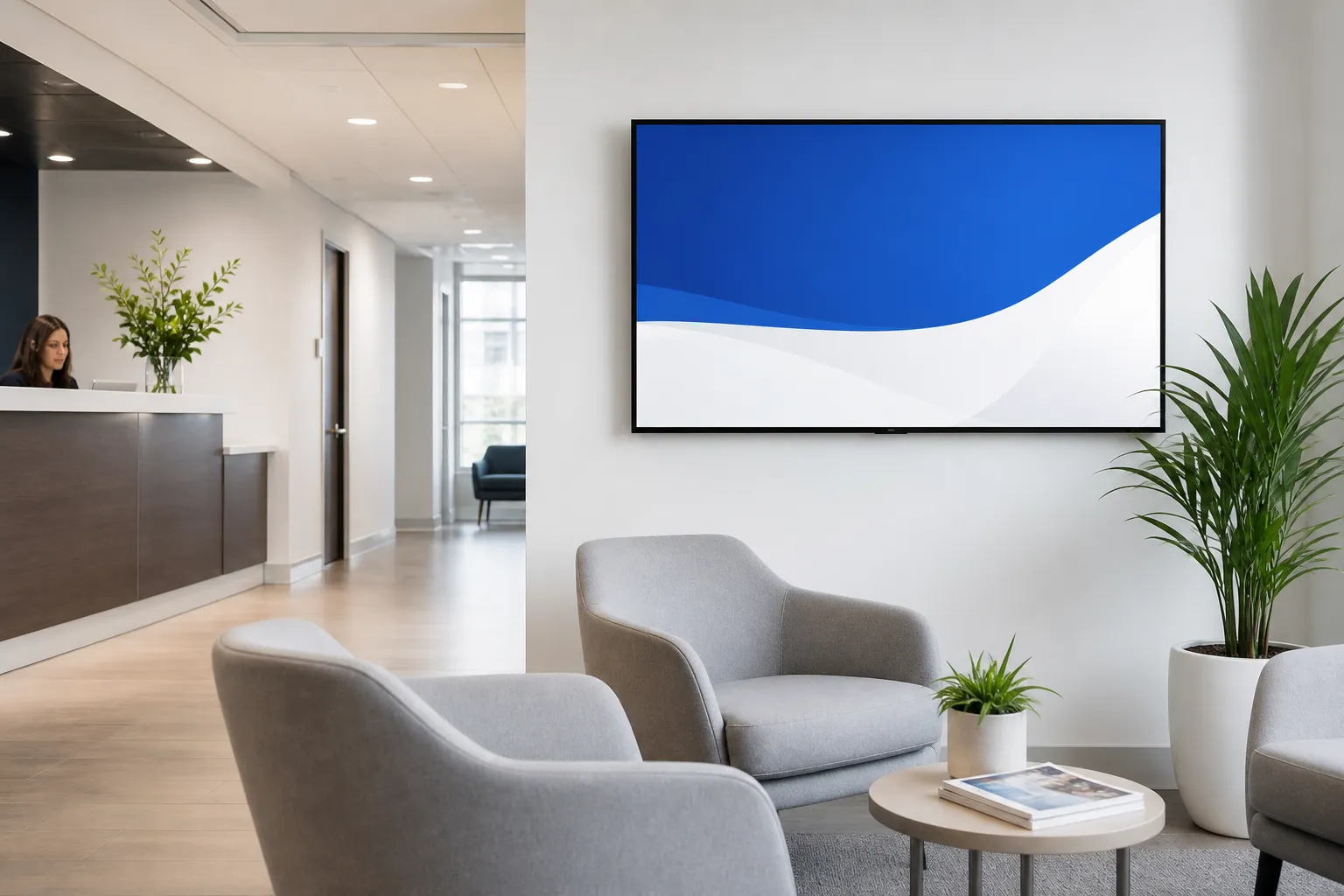 Digital welcome screen in a bright, modern business reception waiting area